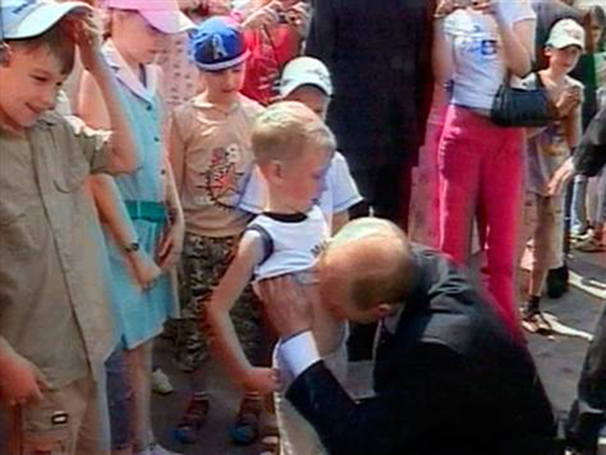 putin-boy-kiss